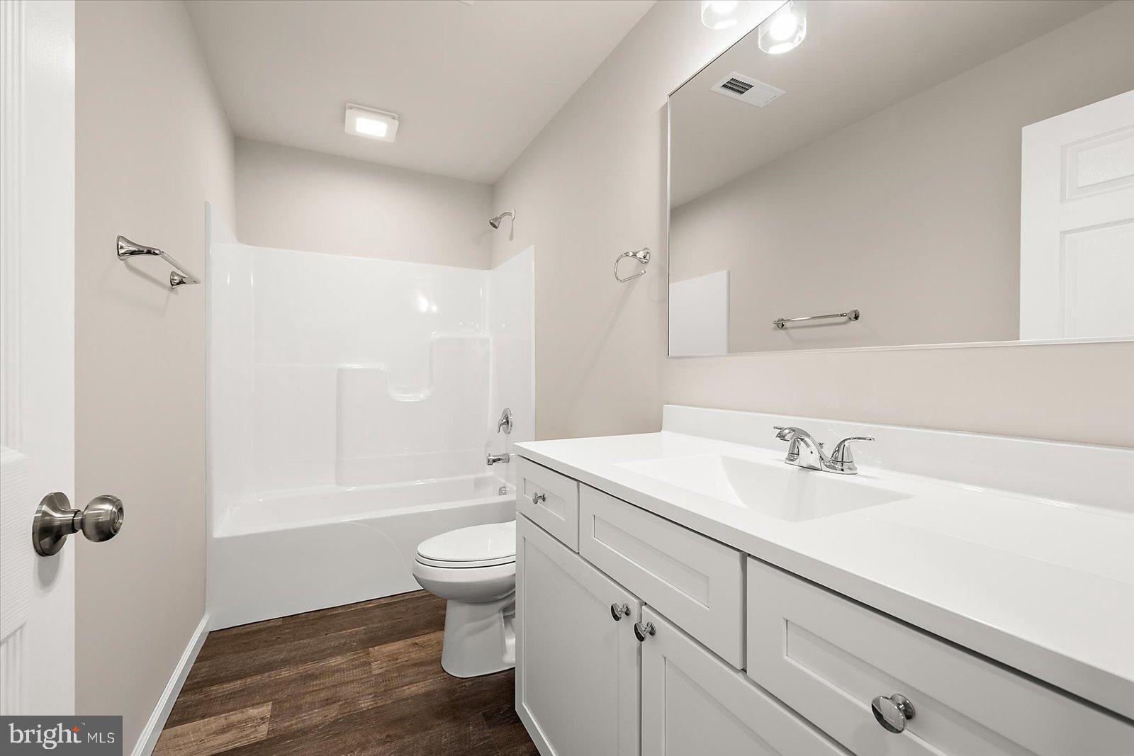 3963 Disharoon Road Eden, MD 21822 - Photo 36 of 61 a bathroom with a sink a toilet and shower