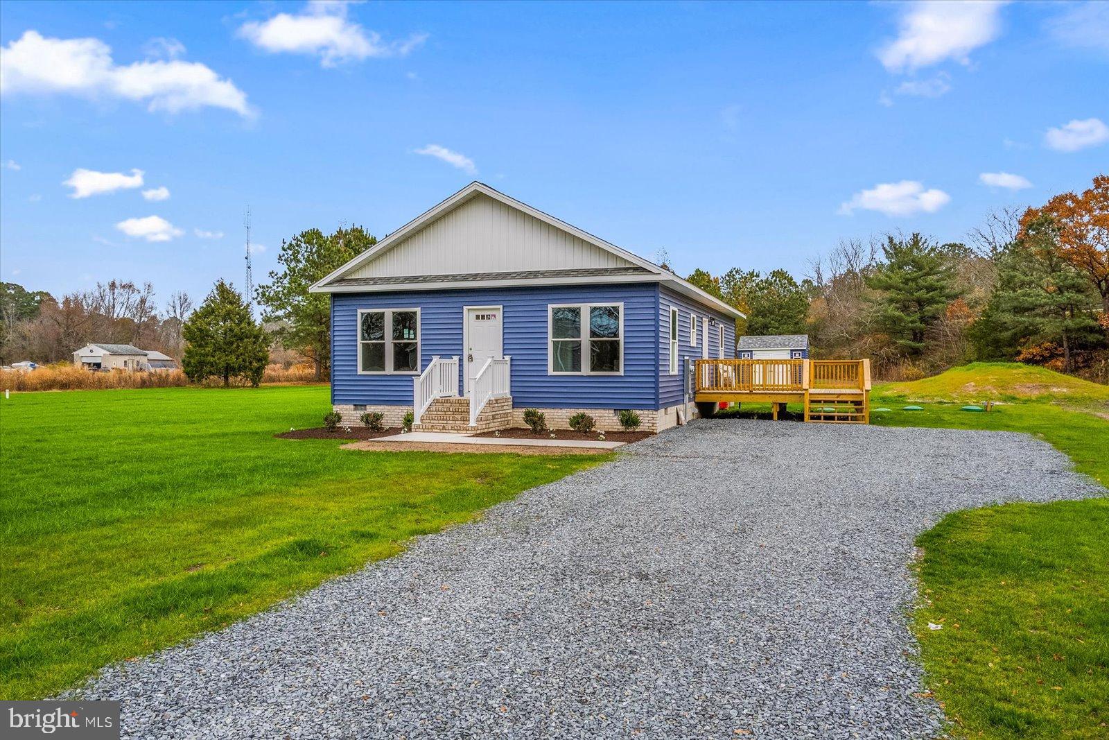 3963 Disharoon Road Eden, MD 21822 - Photo 4 of 61 a front view of a house with garden