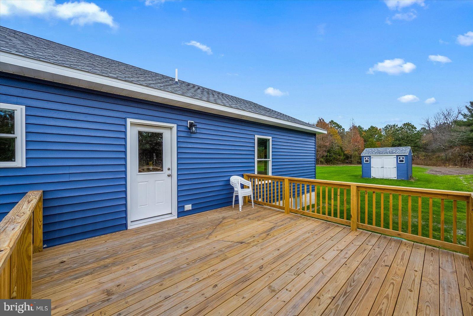 3963 Disharoon Road Eden, MD 21822 - Photo 42 of 61 a view of a house with wooden deck