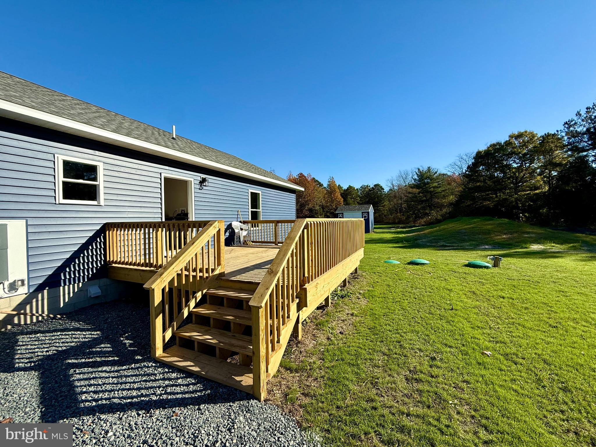 3963 Disharoon Road Eden, MD 21822 - Photo 45 of 61 Sunny deck overlooking lush green lawn.