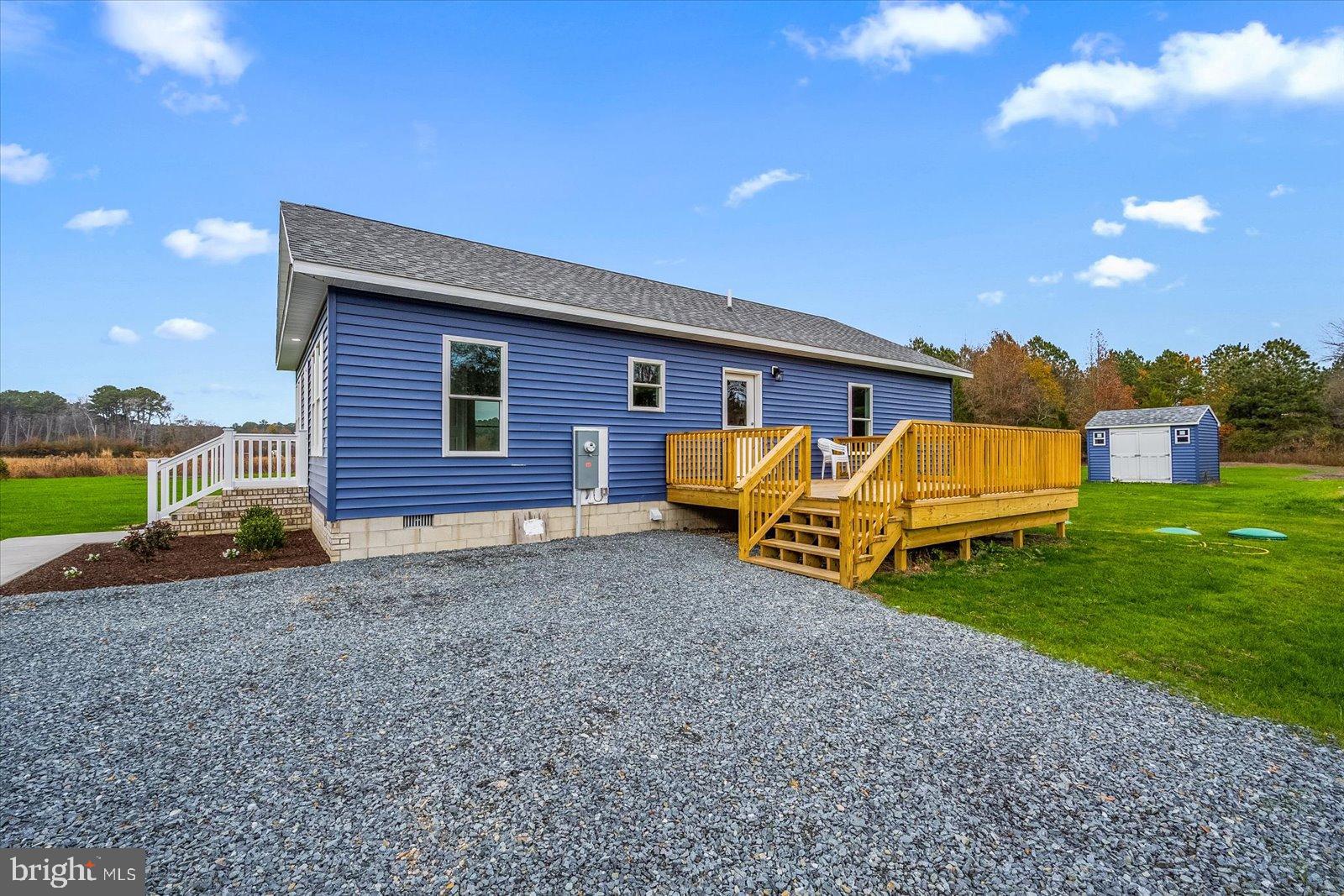3963 Disharoon Road Eden, MD 21822 - Photo 46 of 61 a view of a house with a backyard and porch
