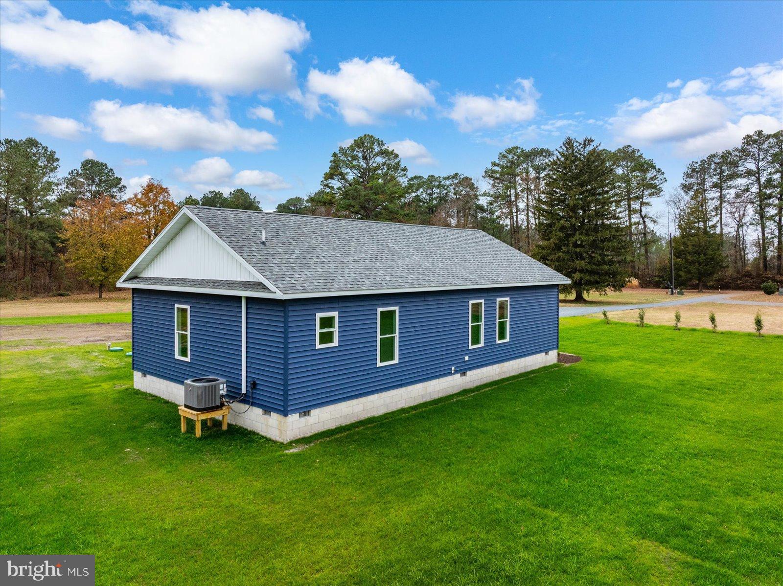 3963 Disharoon Road Eden, MD 21822 - Photo 51 of 61 a aerial view of a house with a yard table and chairs