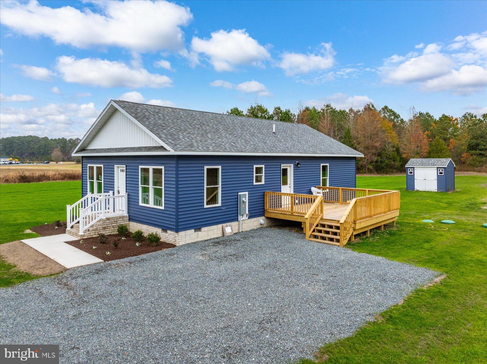 3963 Disharoon Road Eden, MD 21822 - Photo 10 of 61 a front view of a house with garden