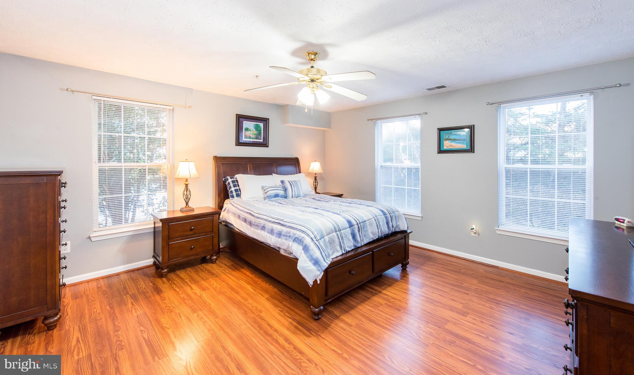 2442 Blue Spring Court, Unit 102 Odenton, MD 21113 - Photo 14 of 26 Master Bedroom