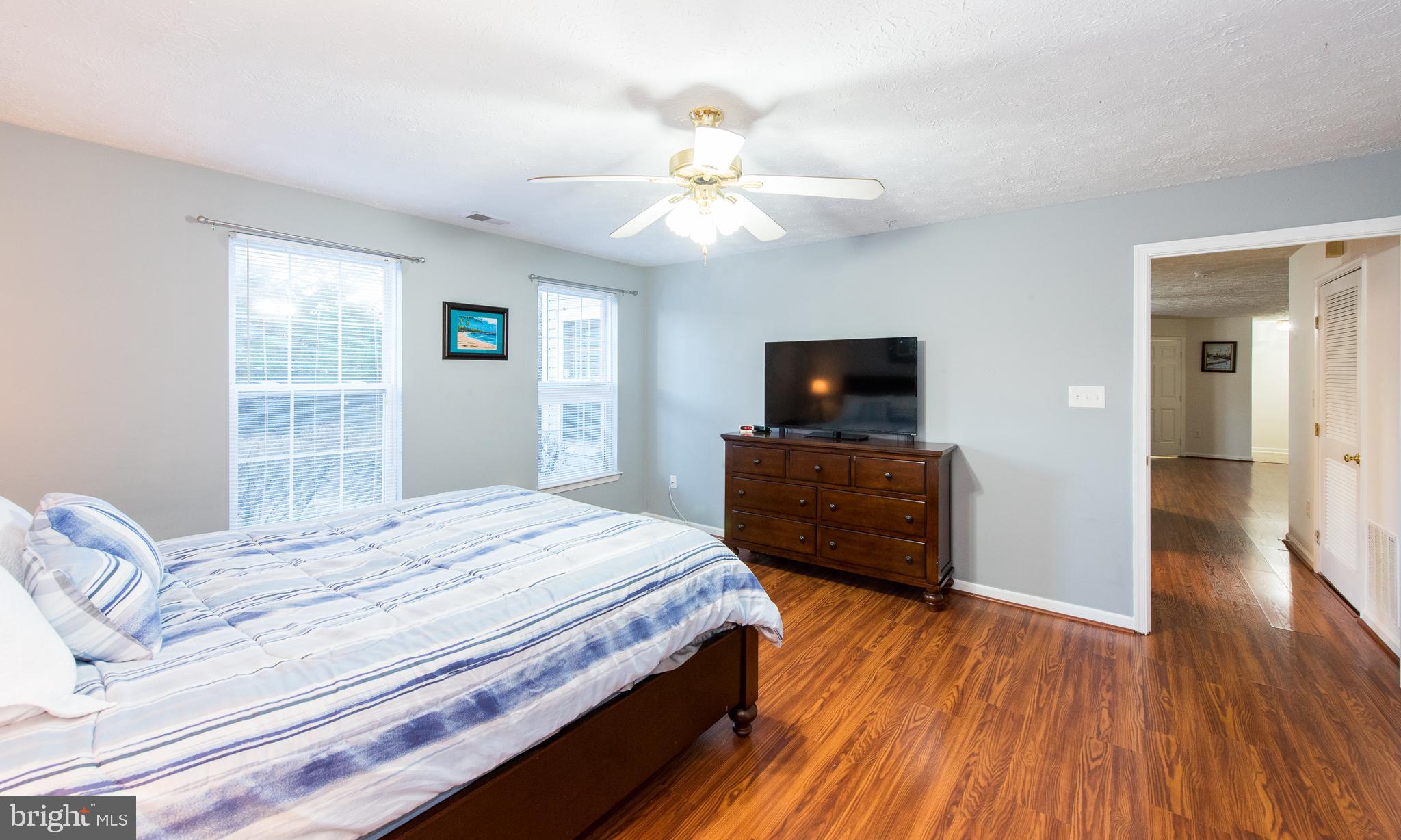 2442 Blue Spring Court, Unit 102 Odenton, MD 21113 - Photo 16 of 26 Master Bedroom