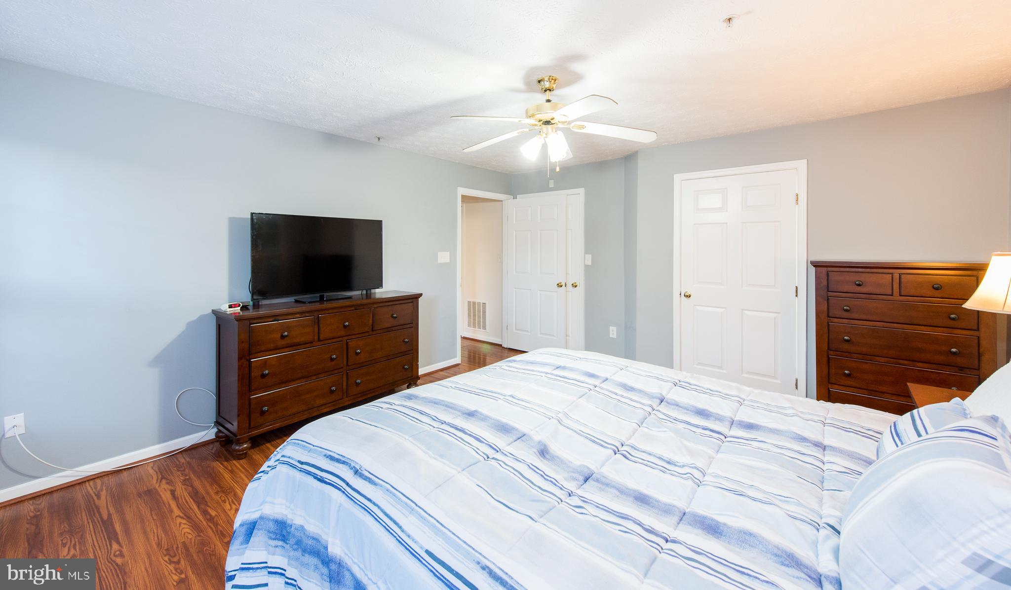 2442 Blue Spring Court, Unit 102 Odenton, MD 21113 - Photo 17 of 26 Master Bedroom