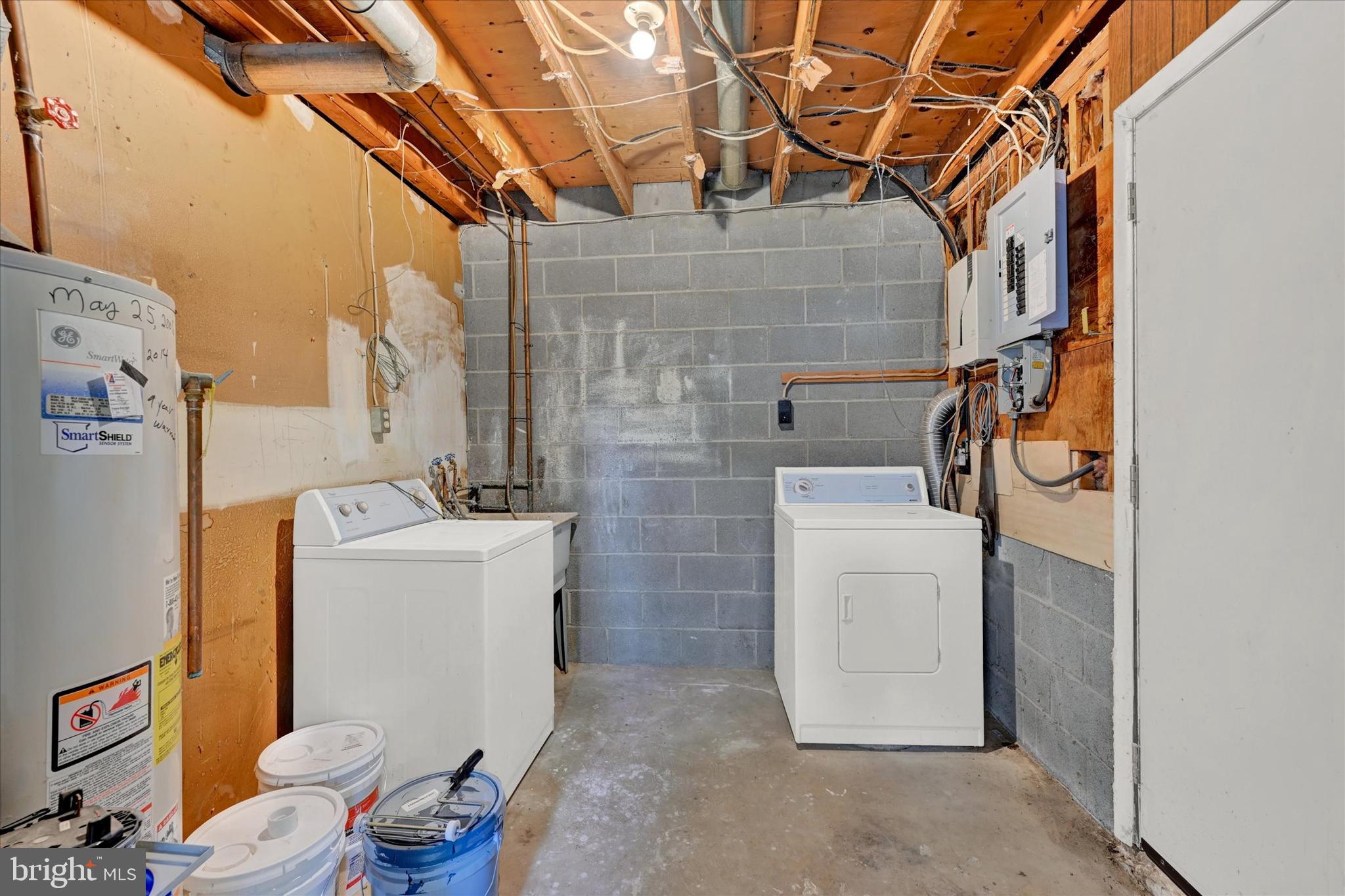 8577 Main Avenue Pasadena, MD 21122 - Photo 16 of 19 a utility room with dryer and washer