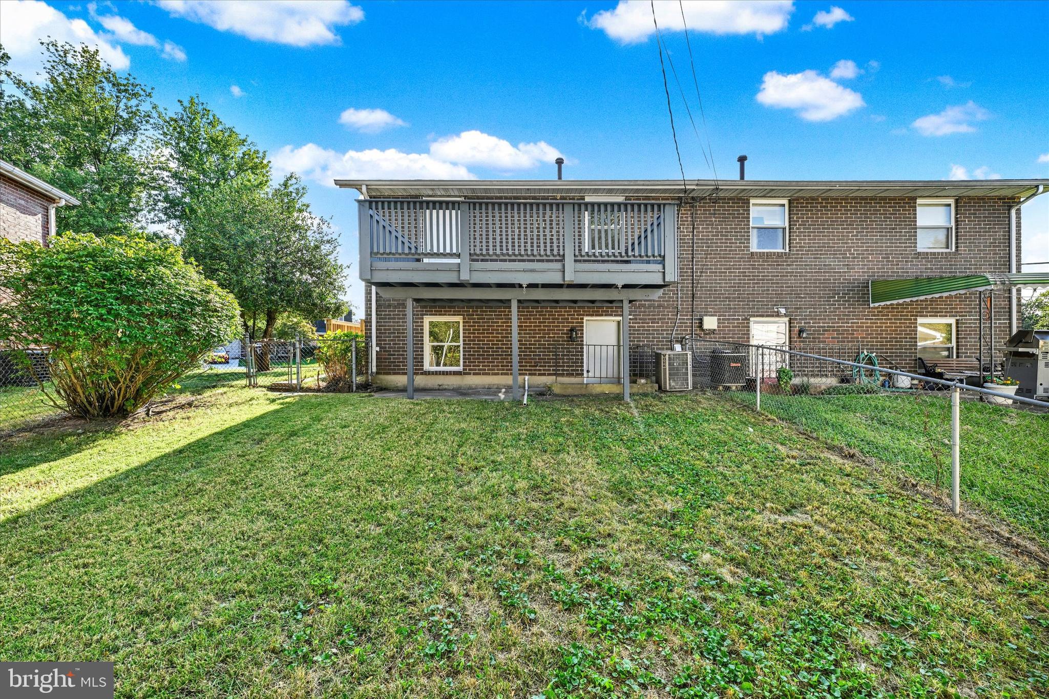8577 Main Avenue Pasadena, MD 21122 - Photo 19 of 19 a house view with a garden space