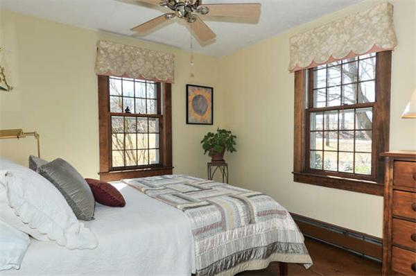 37 Sampson Road Bolton, MA 01740 - Photo 14 of 29 a bedroom with a bed next to a window