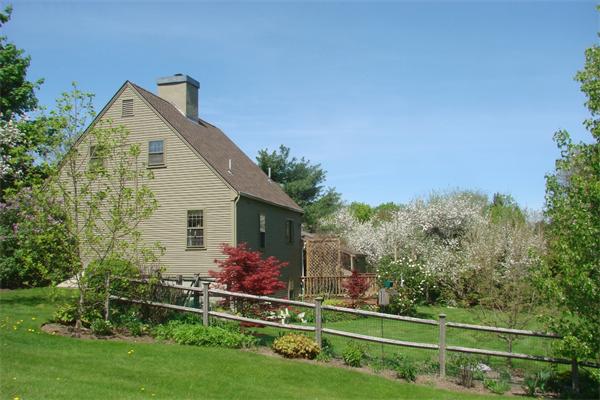 37 Sampson Road Bolton, MA 01740 - Photo 28 of 29 a front view of a house with a yard