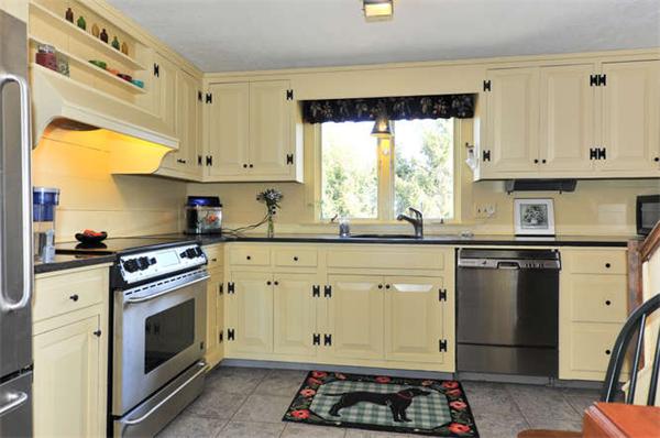 37 Sampson Road Bolton, MA 01740 - Photo 5 of 29 a kitchen with granite countertop a sink stainless steel appliances and window
