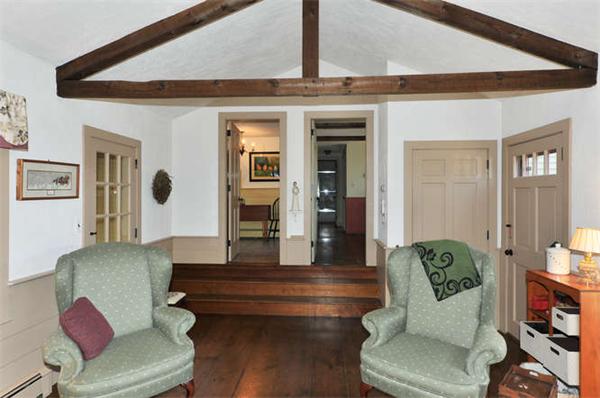 37 Sampson Road Bolton, MA 01740 - Photo 7 of 29 a living room with furniture and a potted plant