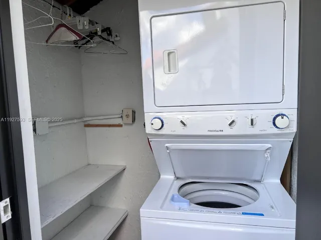 a view of a lake with a yard