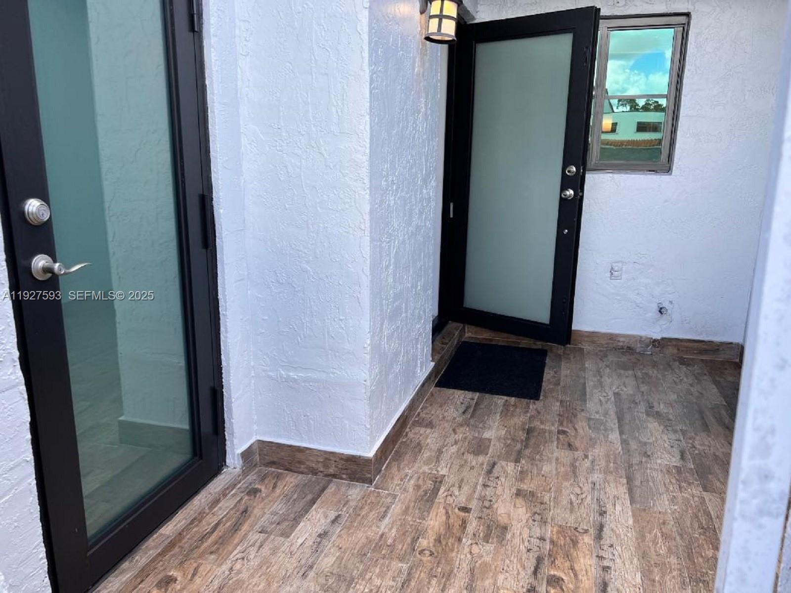 6231 Southwest 138th Court, Unit G Miami, FL 33183 - Photo 6 of 46 IMPACT DOORS