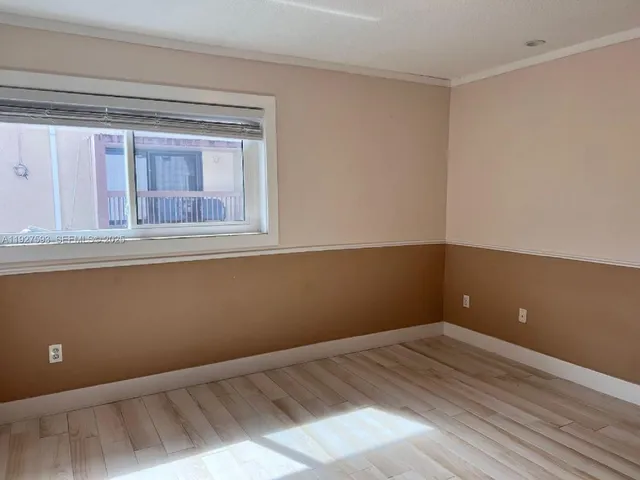 an aerial view of a house with swimming pool garden view and a fire pit