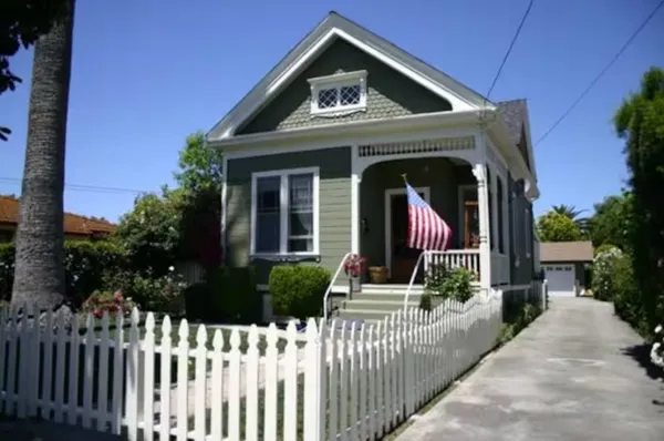 a front view of a house with glass windows