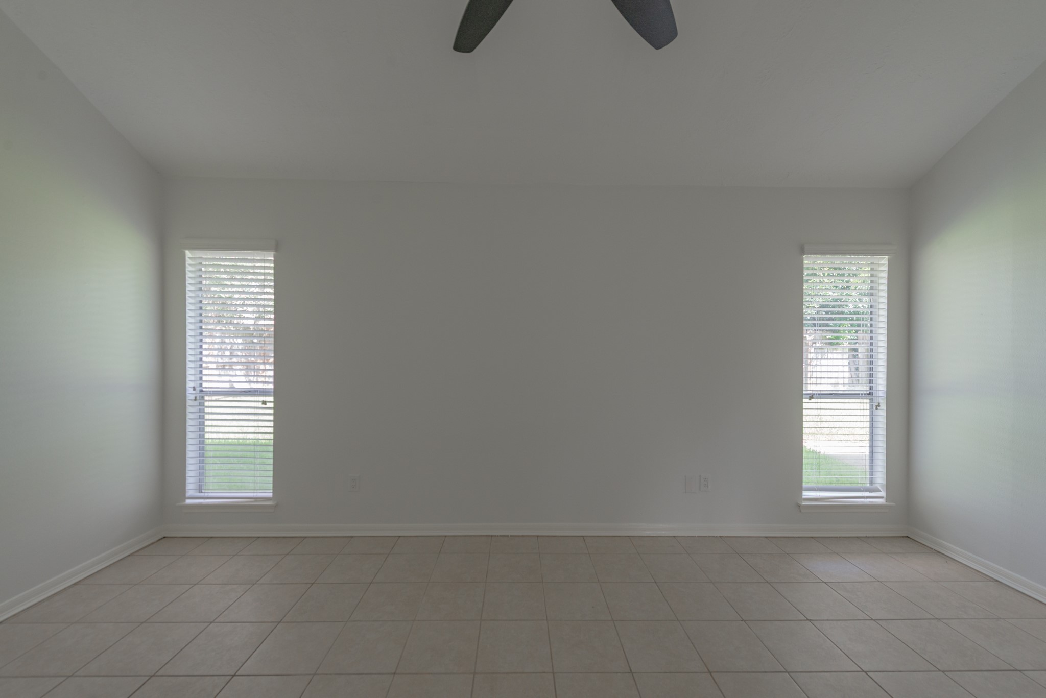 1022 White Sands Road Katy, TX 77450 - Photo 16 of 27 Floor to ceiling windows in primary bedroom.