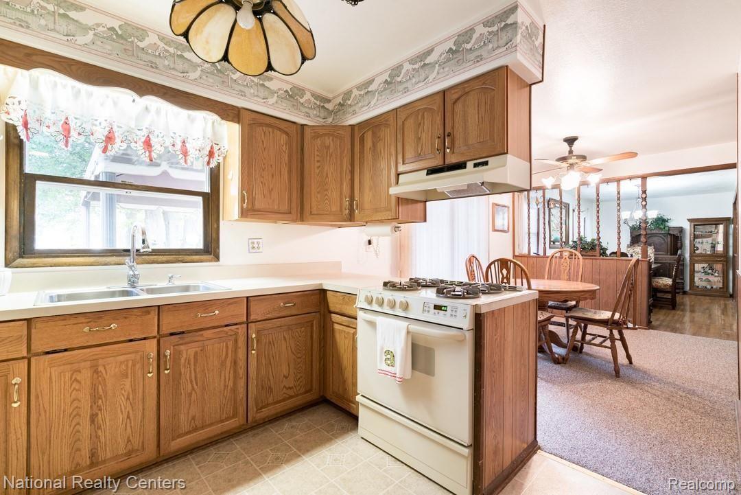 1615 East Wattles Road Troy, MI 48085 - Photo 11 of 25 Kitchen open to eat in area and dining room