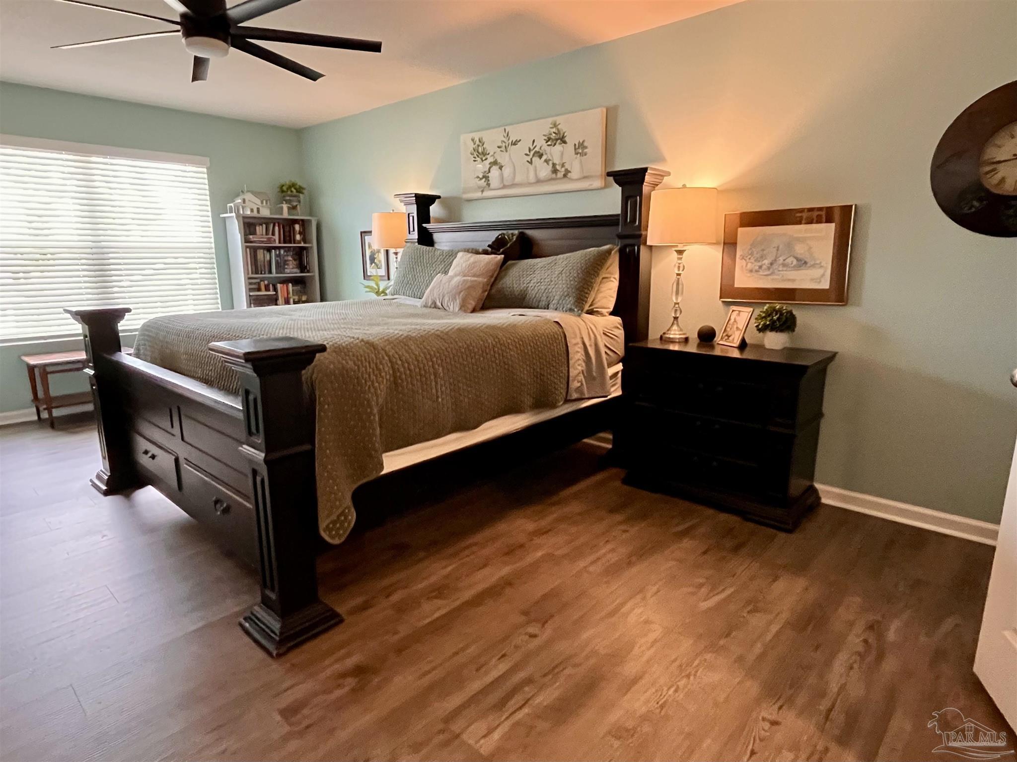 5375 Peach Drive Milton, FL 32571 - Photo 16 of 34 a bedroom with a bed and window