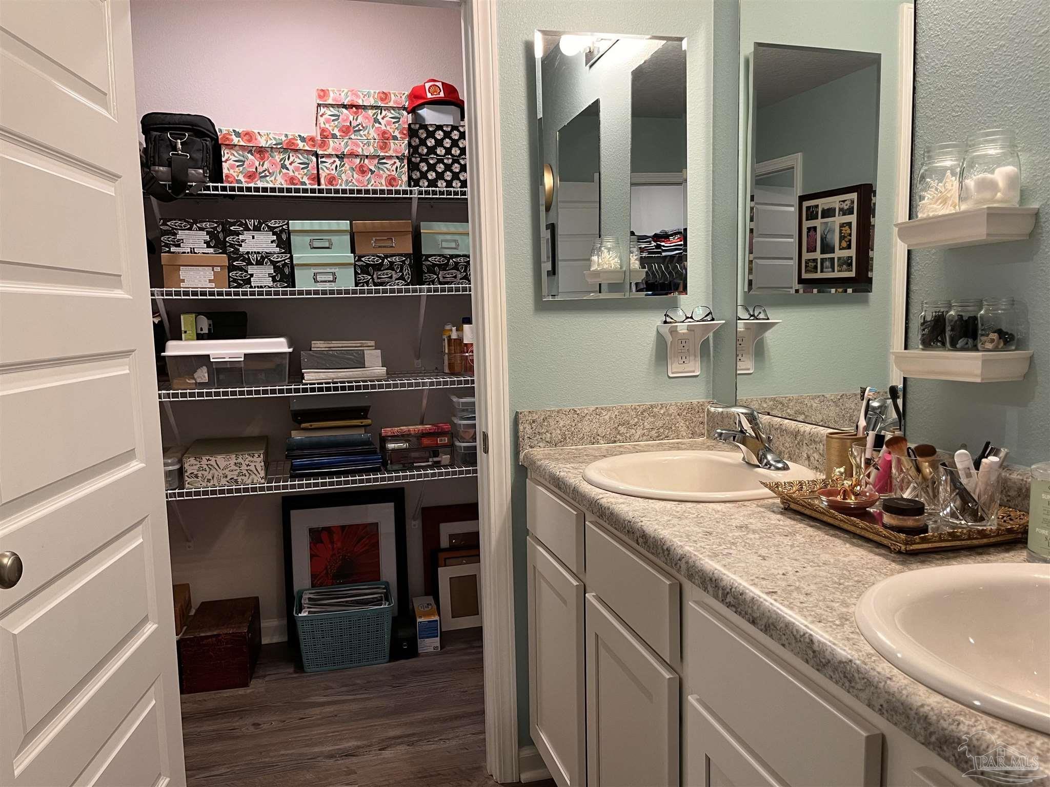 5375 Peach Drive Milton, FL 32571 - Photo 20 of 34 a kitchen with a sink and cabinets