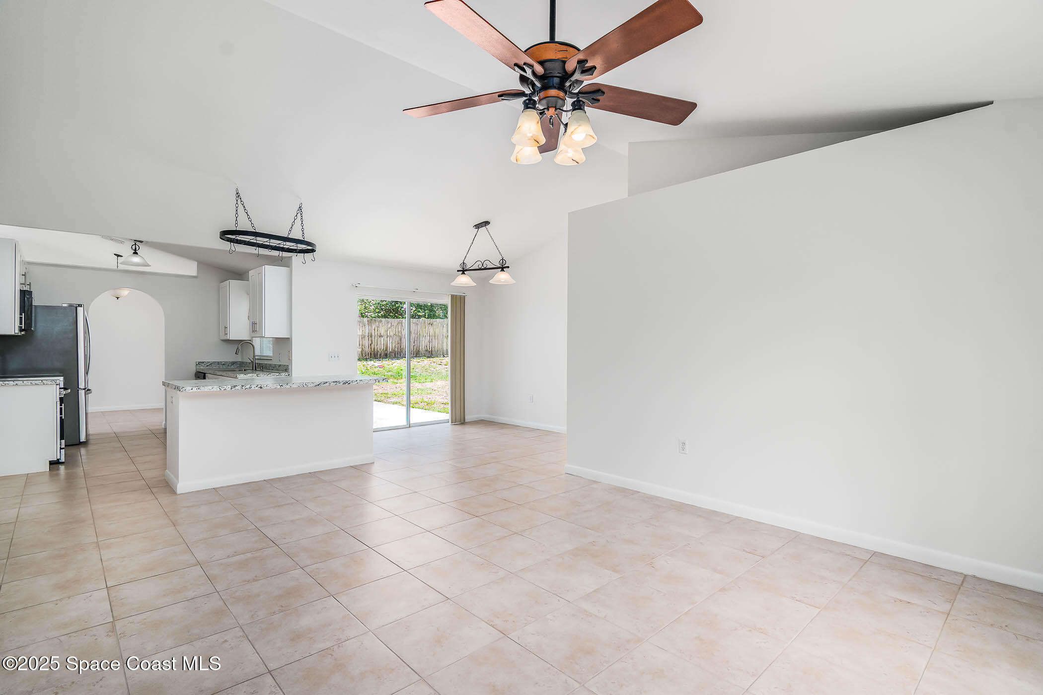 6760 Cairo Road Cocoa, FL 32927 - Photo 35 of 51 a view of a kitchen with a sink and cabinets