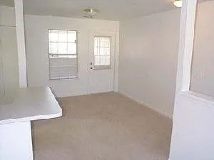 an empty room with windows