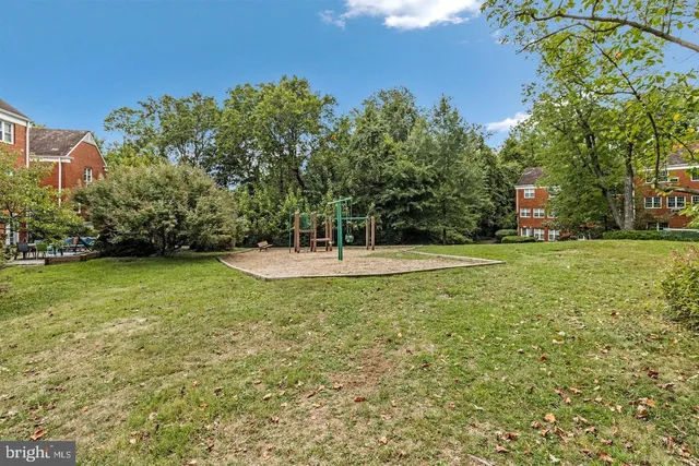 a view of a park with a slide