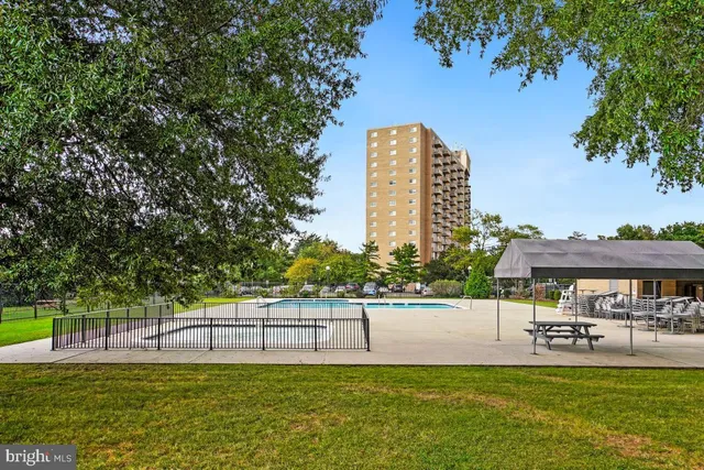 a view of a swimming pool with an outdoor space