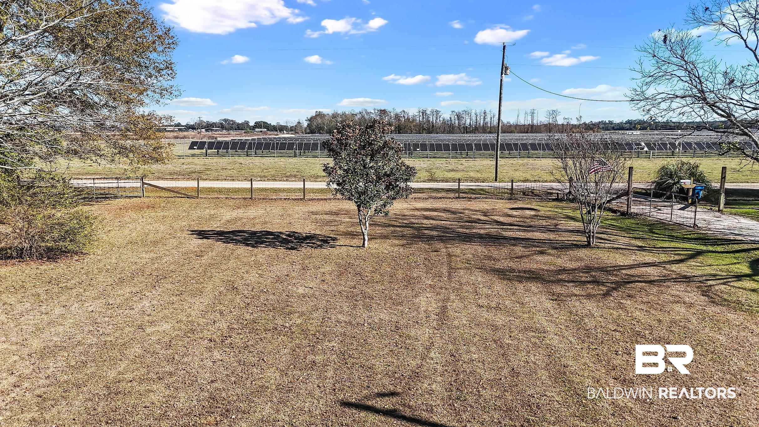 110 Sam Jones Road Atmore, AL 36502 - Photo 32 of 47 View of yard with a view of countryside