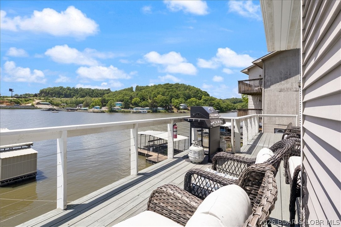 472 Jupiter Road Camdenton, MO 65020 - Photo 11 of 59 BBQ right off the Kitchen, even a pass thru window
