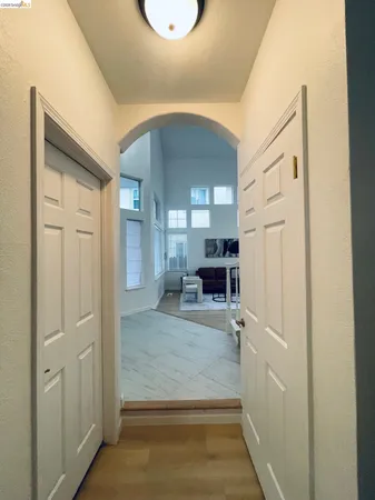 a view of a livingroom with wooden floor