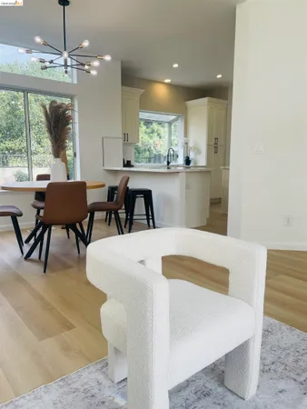 a view of entryway with workspace and wooden floor