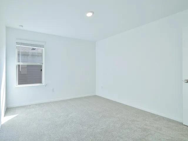 a bathroom with a sink toilet and a mirror