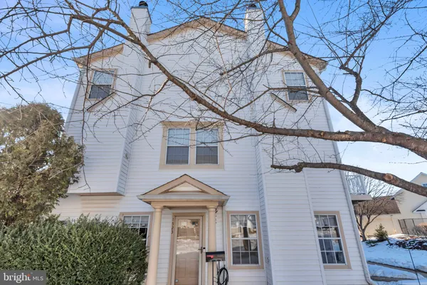 a front view of a house with yard