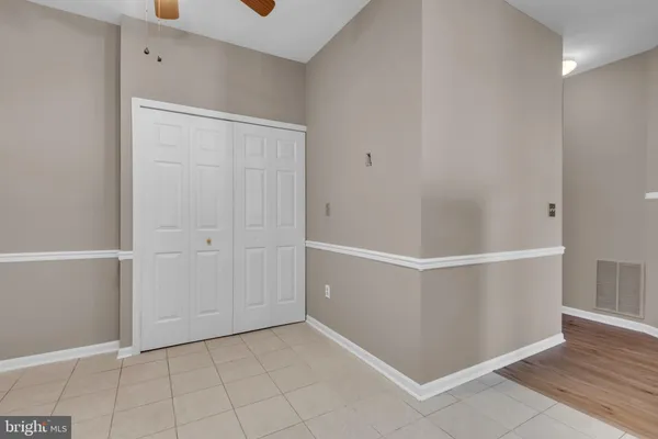 a view of an empty walk in closet