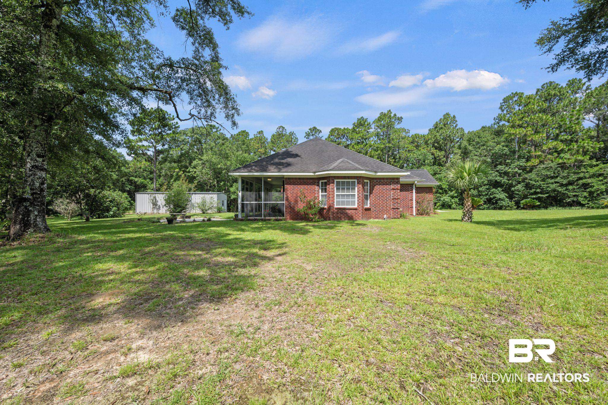 5618 Leytham Road Theodore, AL 36582 - Photo 48 of 60 View of yard featuring a sunroom