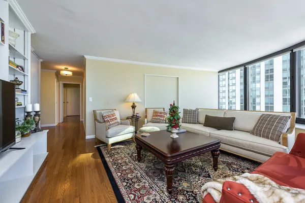 a kitchen with granite countertop lots of counter top space and wooden floor