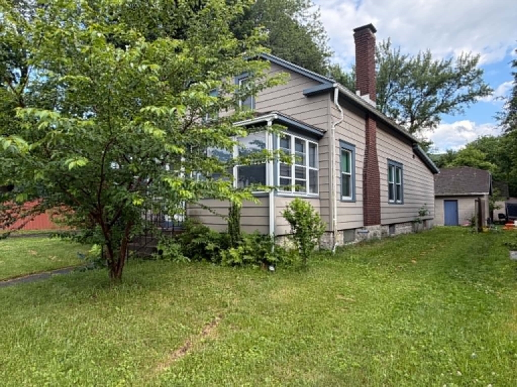 280 State Road North Adams, MA 01247 - Photo 3 of 35 a view of a house with backyard and garden