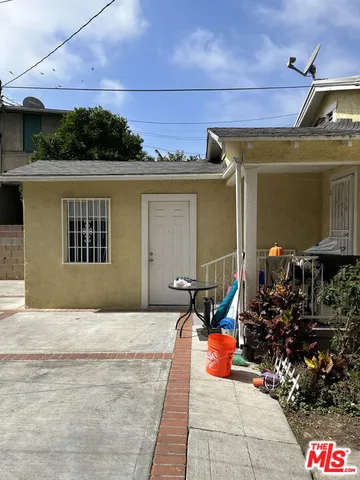 a view of swimming pool with seating space