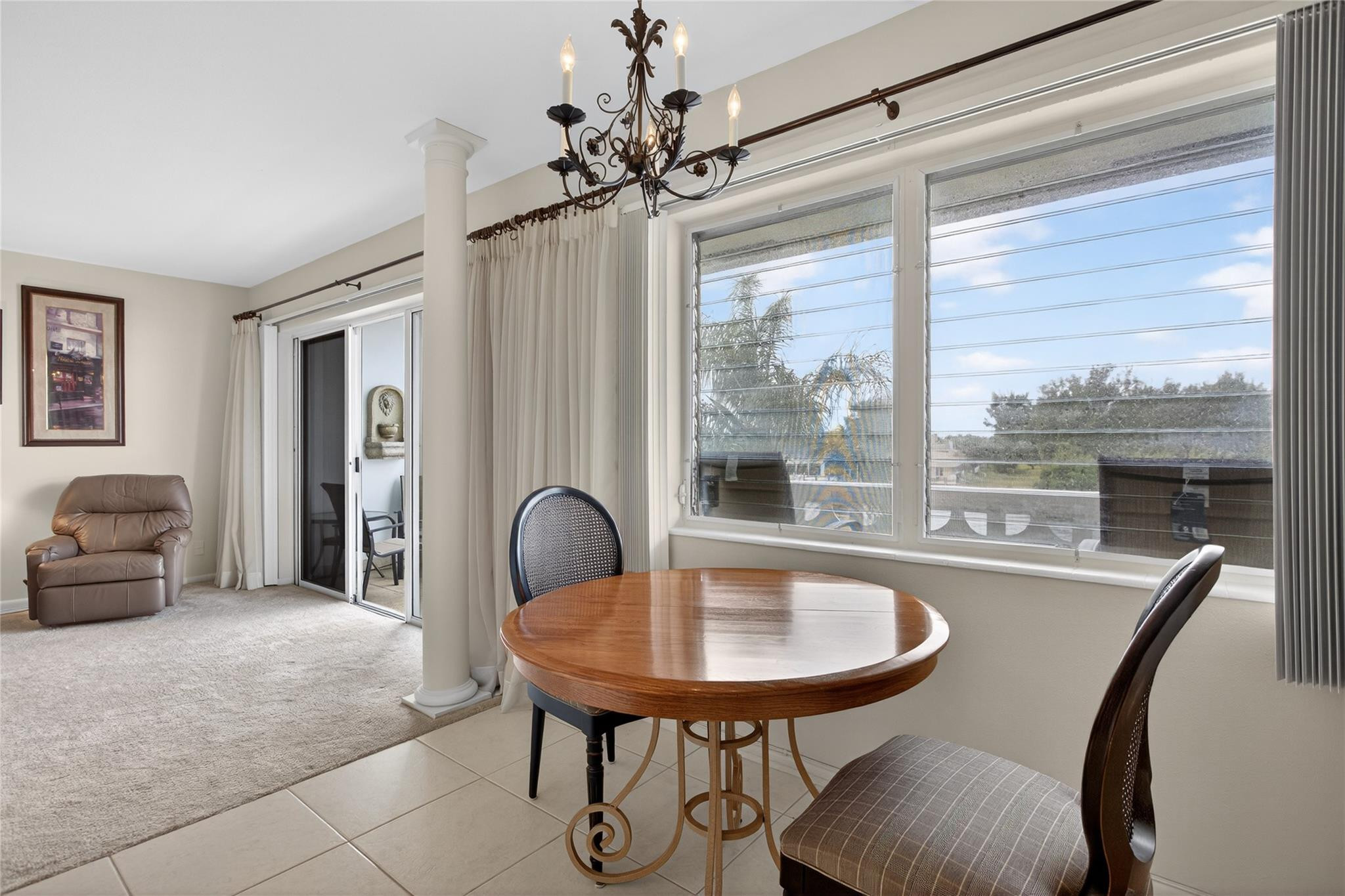1001 North Riverside Drive, Unit 305 Pompano Beach, FL 33062 - Photo 15 of 44 a view of a dining room with furniture window and outside view