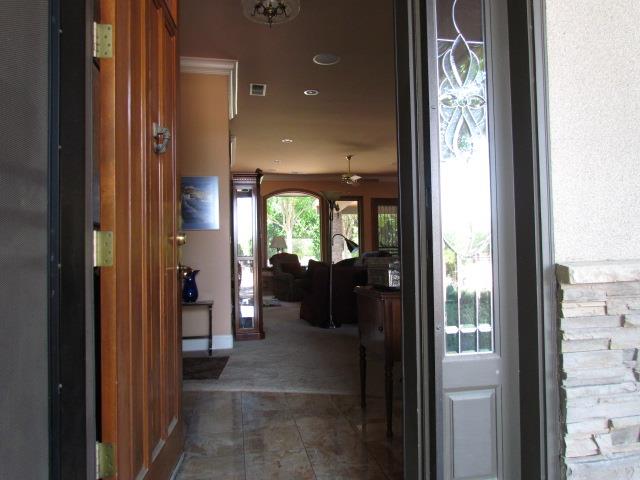 1072 Rorden Avenue Selma, CA 93662 - Photo 5 of 40 a view of a hallway with wooden shelves