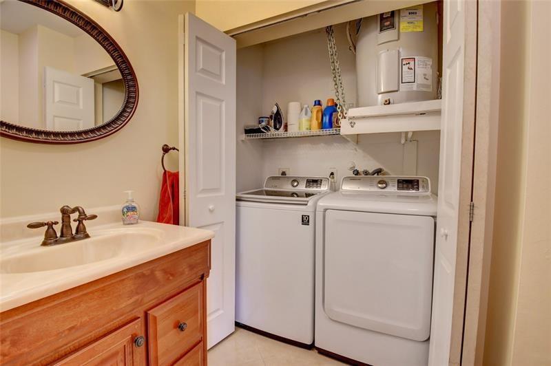 9316 Ketay Circle Boca Raton, FL 33428 - Photo 28 of 30 a bathroom with a sink and a mirror