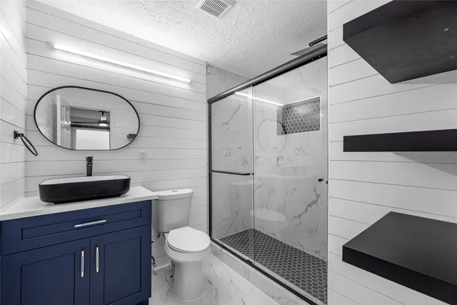 a view of kitchen and microwave