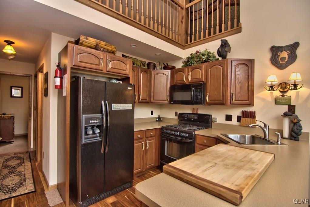 95 Rhododendron Road Jim Thorpe, PA 18229 - Photo 13 of 50 The Kitchen featues hardwood floors & cabinetry, p