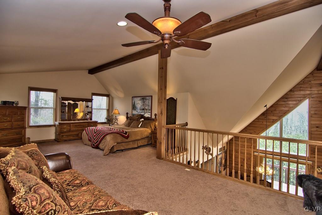 95 Rhododendron Road Jim Thorpe, PA 18229 - Photo 27 of 50 The Master boasts a vaulted ceiling w/ exposed bea