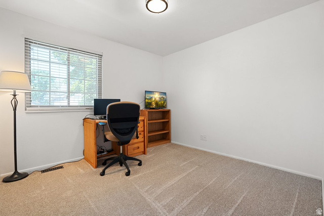 865 South 325 West Orem, UT 84058 - Photo 26 of 38 Carpeted room with a window featuring horizontal blinds, recessed lighting, and white walls