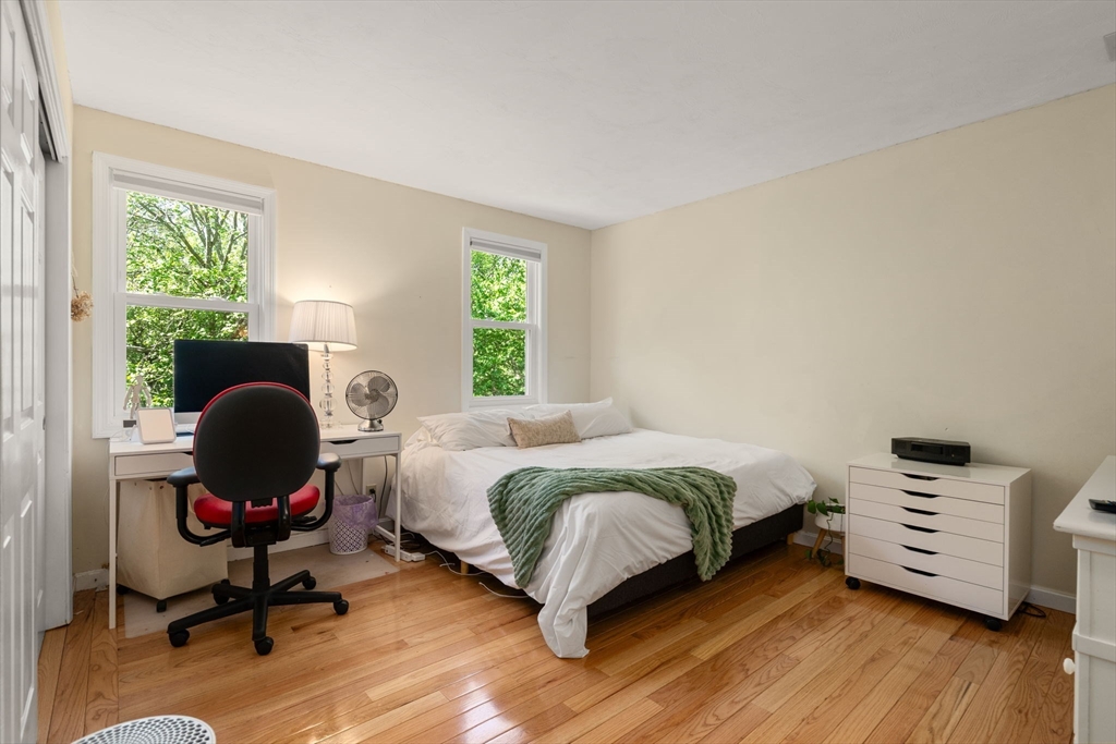 11 Cow Hill Road Sharon, MA 02067 - Photo 25 of 30 a bedroom with a bed chair and a window