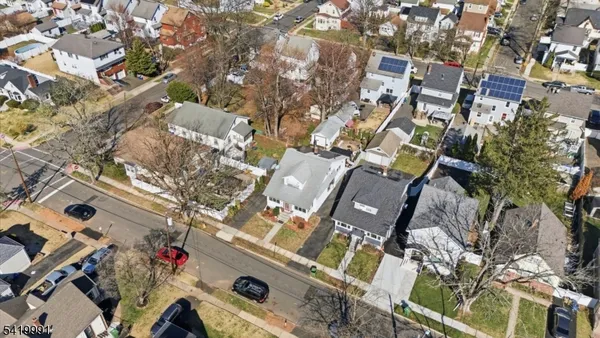 an aerial view of a building with parking space