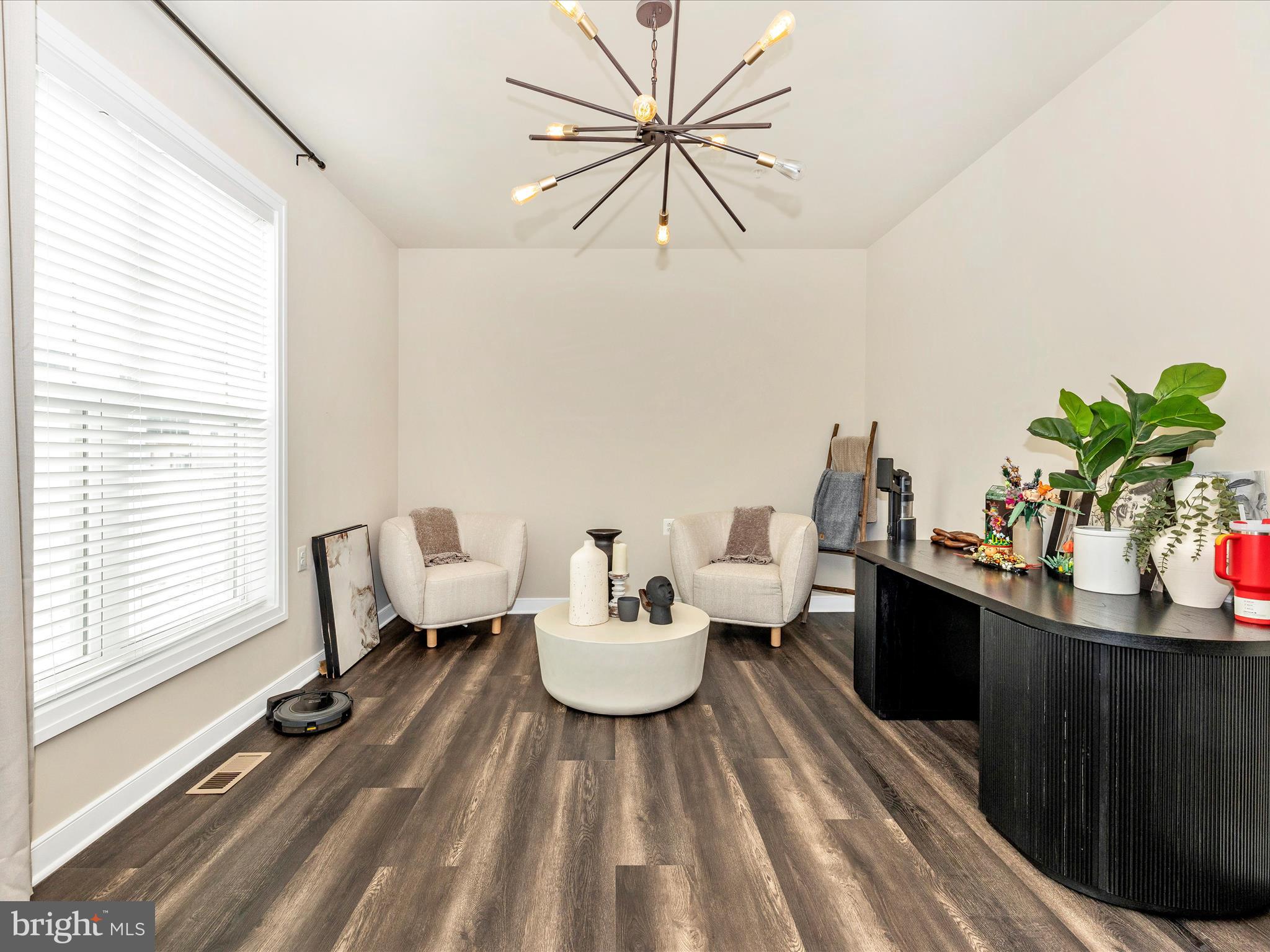 11147 Hazelnut Lane Monrovia, MD 21770 - Photo 13 of 66 a living room with furniture and a large window
