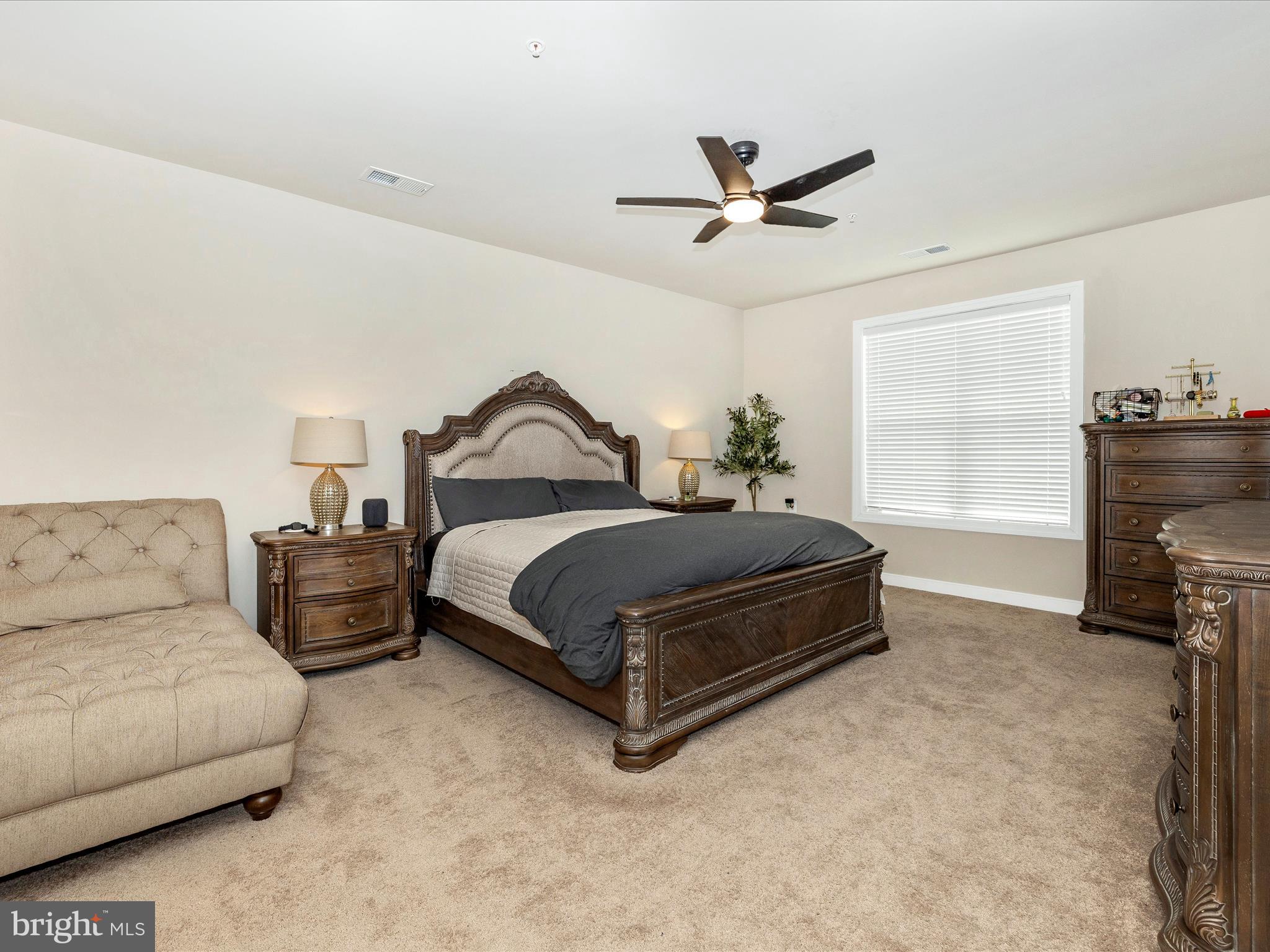 11147 Hazelnut Lane Monrovia, MD 21770 - Photo 21 of 66 a bedroom with a bed and a ceiling fan